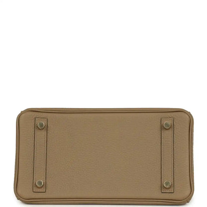 Beige pebbled leather handbag base with four corner metal feet and reinforced edges