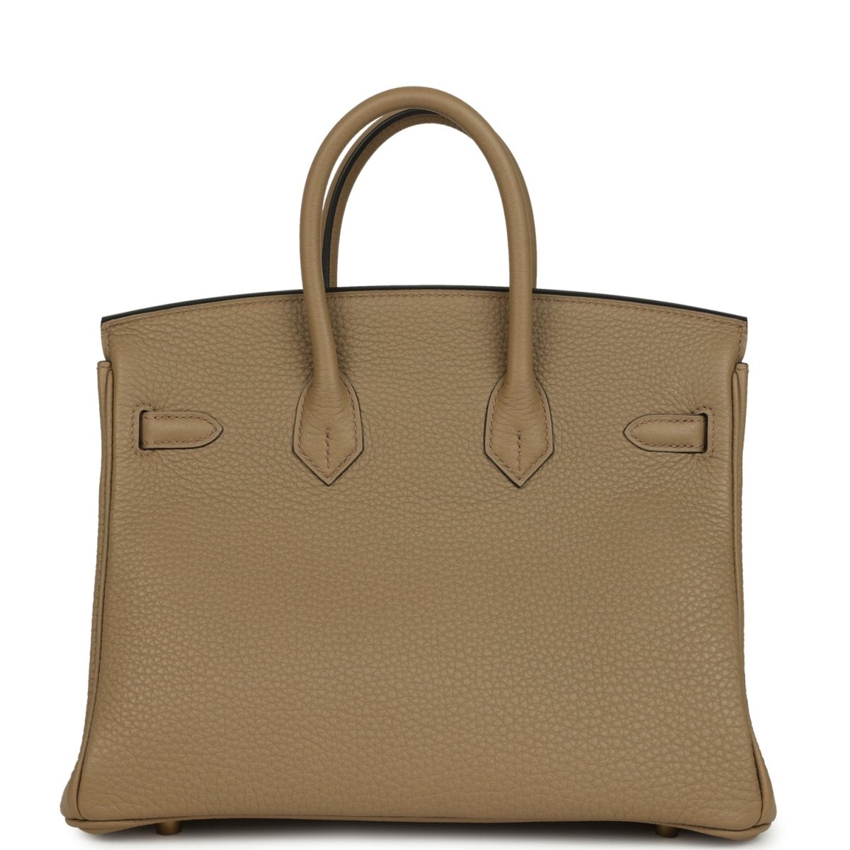 Beige pebbled leather handbag back view with decorative panels and top handles