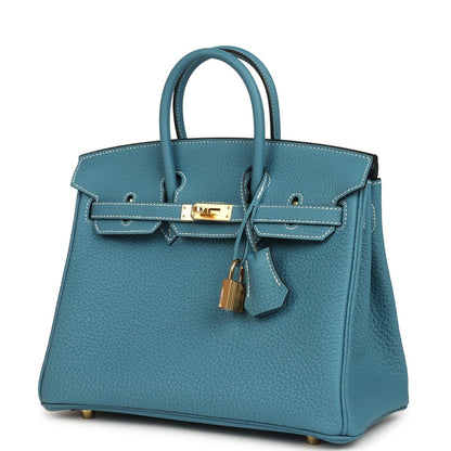 Teal-blue Togo leather handbag with top handles, gold-toned lock and front flap straps