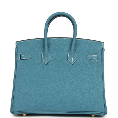 Teal-blue Togo leather handbag with front flap pockets and gold-toned hardware