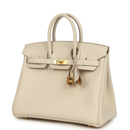 Birkin 25 top-handle handbag in light cream Togo leather, front view with gold lock