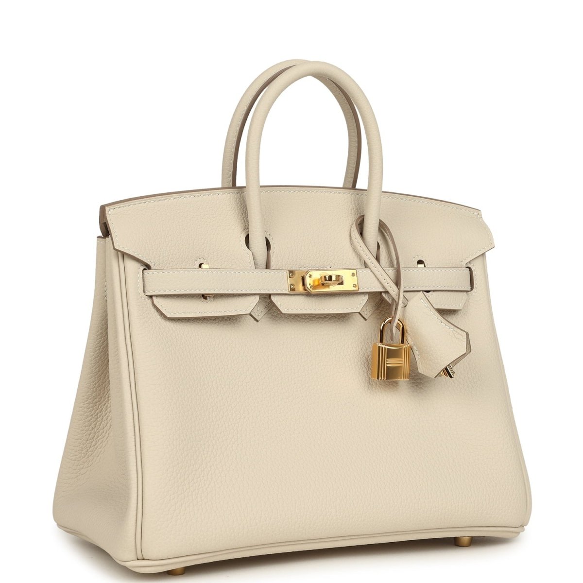 Birkin 25 top-handle handbag in light cream Togo leather with gold hardware, angled front