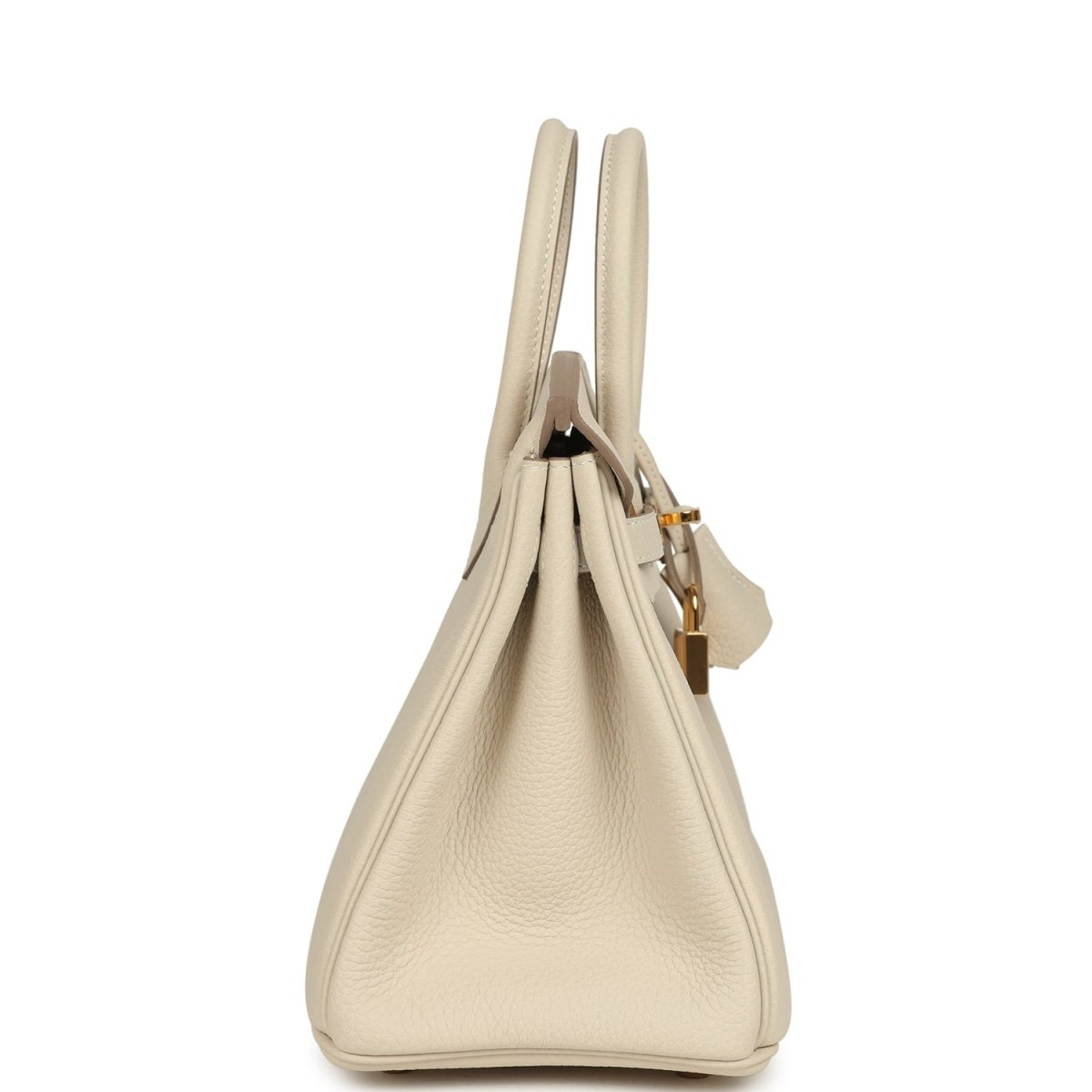 Birkin 25 top-handle handbag in light cream Togo leather, side view with gold hardware