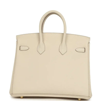 Birkin 25 top-handle handbag in light cream Togo leather, back view with straps