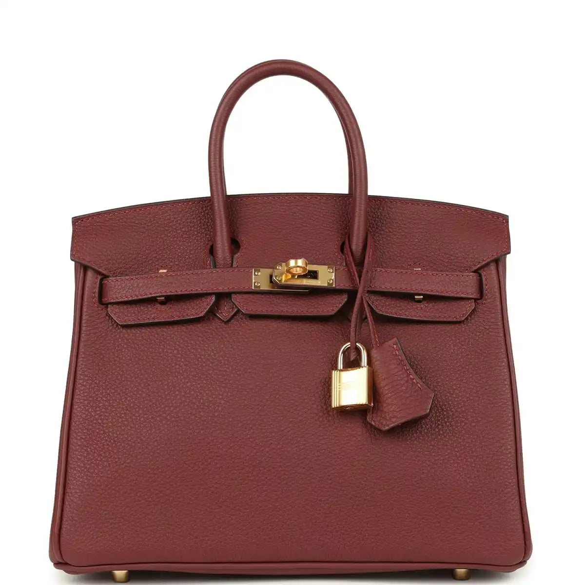 Burgundy leather top-handle handbag with gold hardware, front flap and turn-lock.