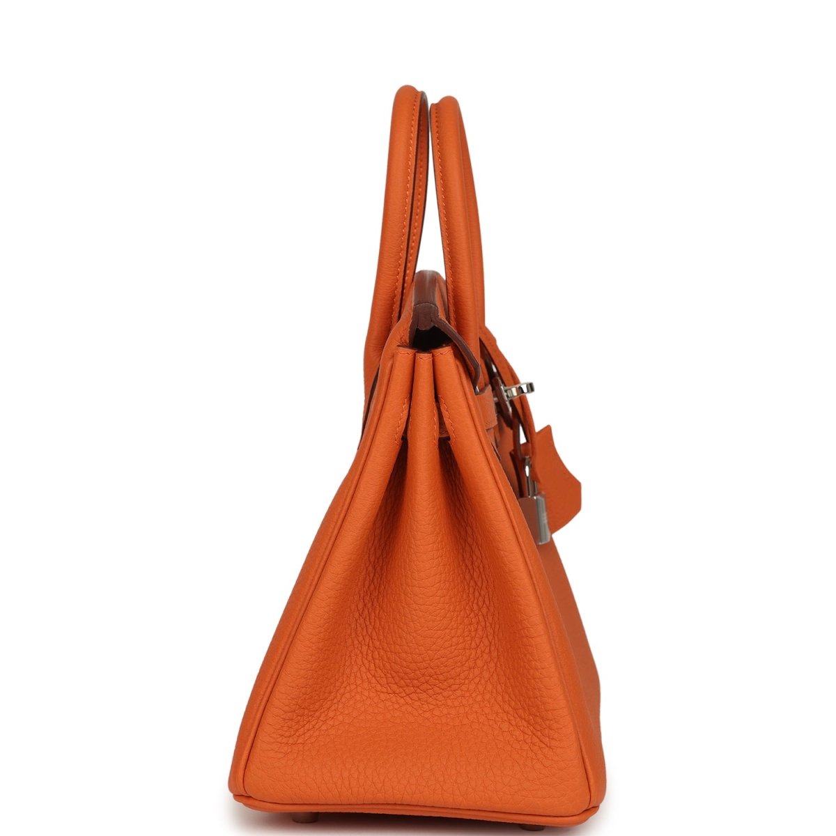 Hermes Birkin 25 handbag in orange leather with upright side profile and top handles