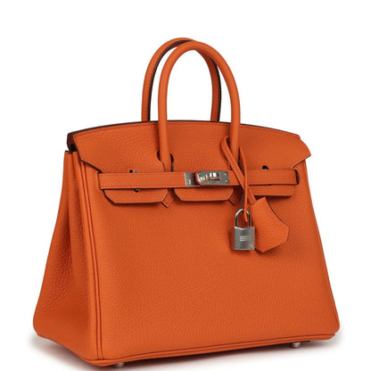 Hermes Birkin 25 handbag in orange leather with top handles and front flap lock