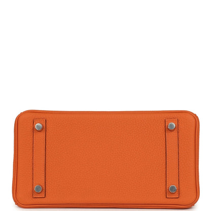 Hermes Birkin 25 handbag in orange leather with base studs and top handles