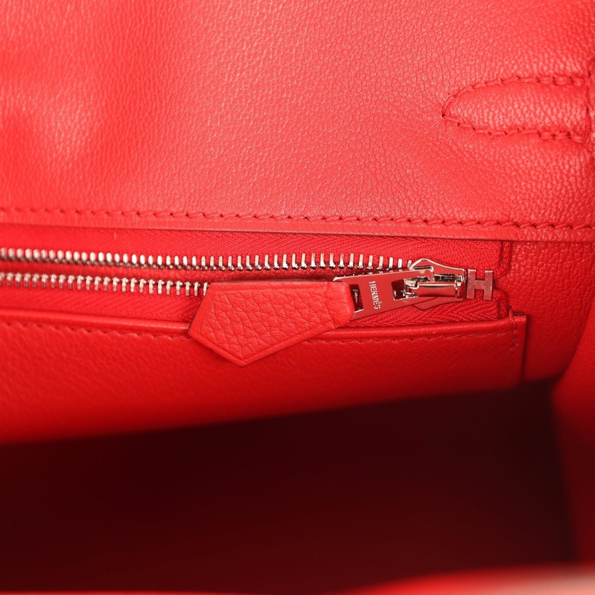 Red Hermes Birkin 25 handbag interior zip pocket with metal zipper pull