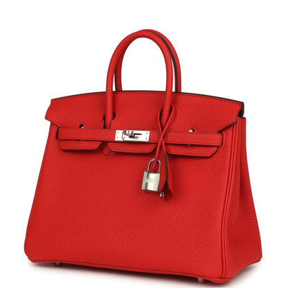 Red Hermes Birkin 25 handbag with front flap, center clasp, and hanging lock charm