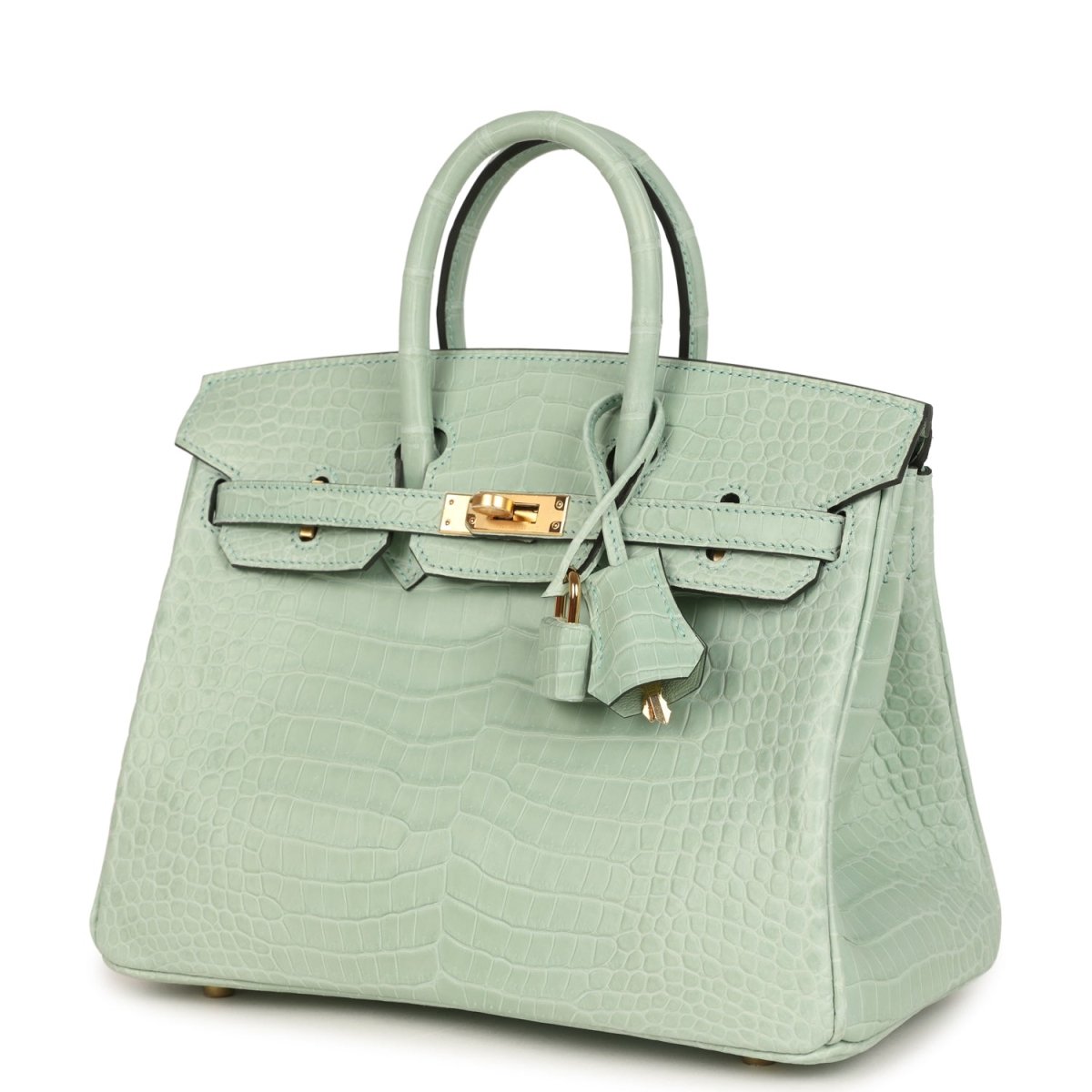 Light green croc-embossed handbag with front flap, gold clasp plate, and key charm