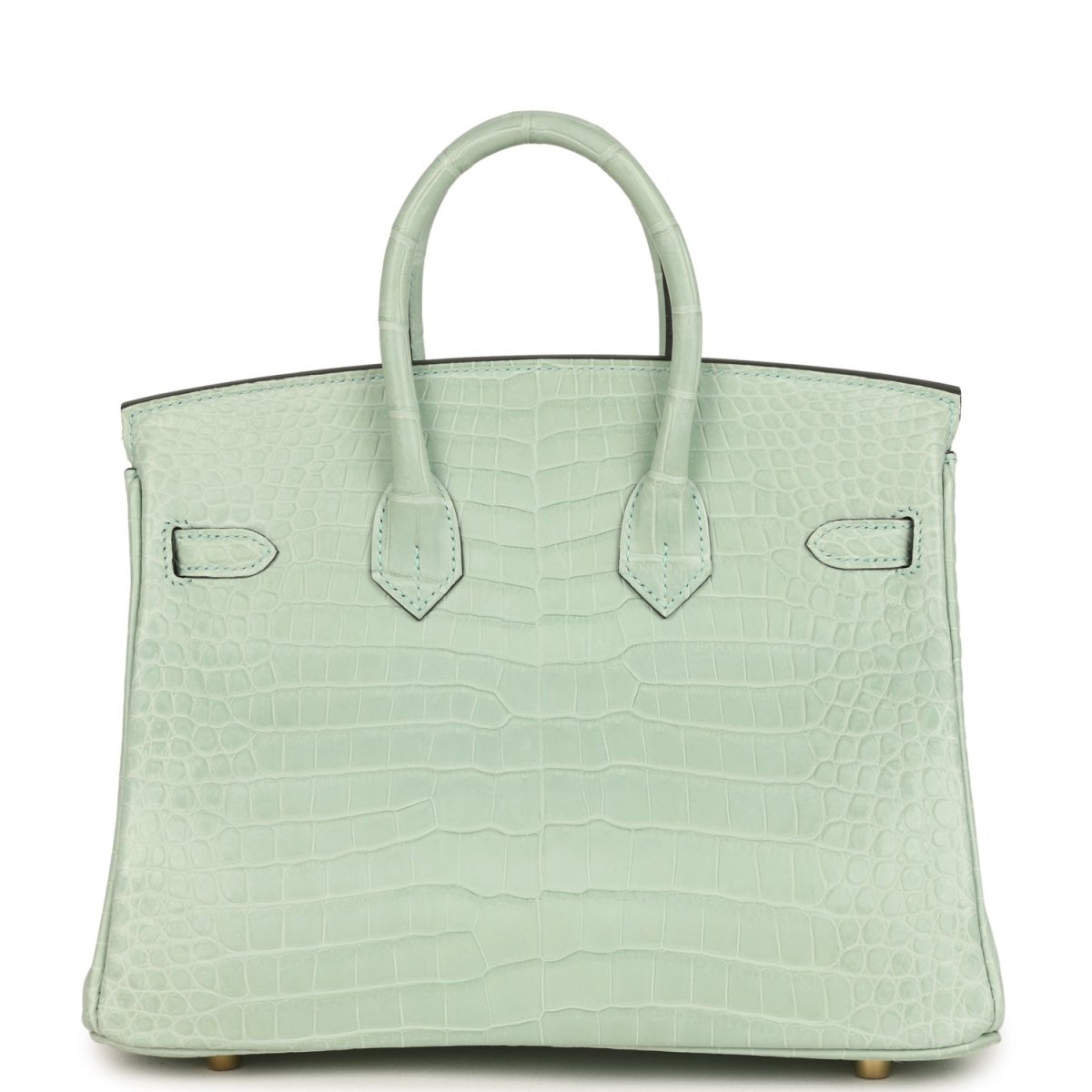 Light green croc-embossed handbag with twin handles and flap front, decorative strap detail