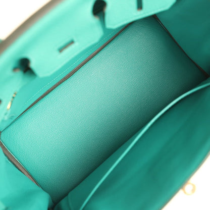 Green leather interior view with smooth lining and side seam stitching