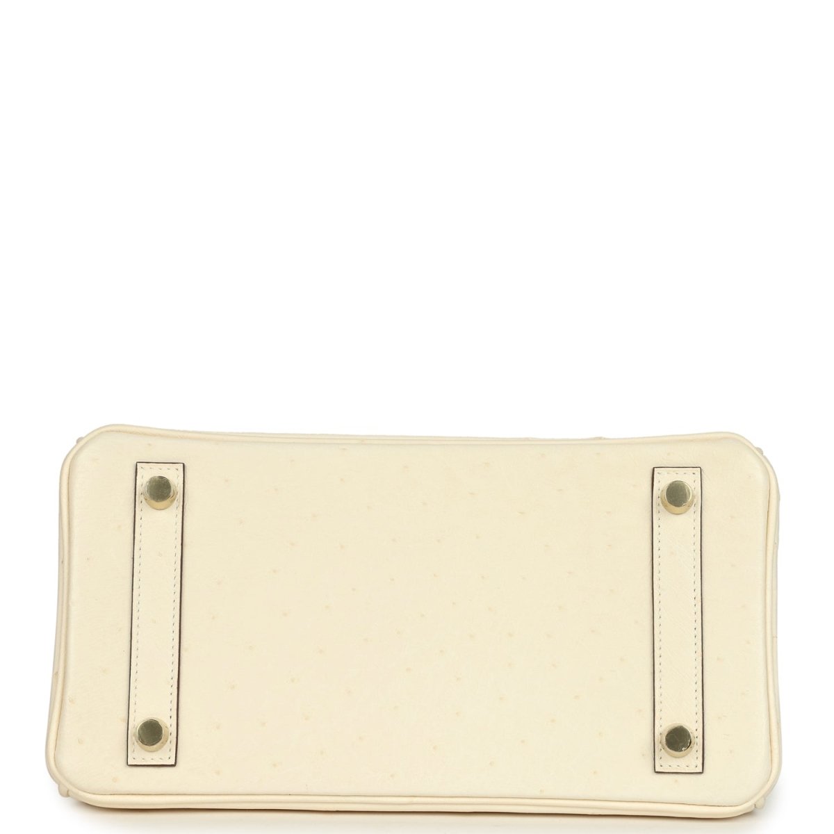 Nata leather handbag base with four corner snap studs and stitched edges.