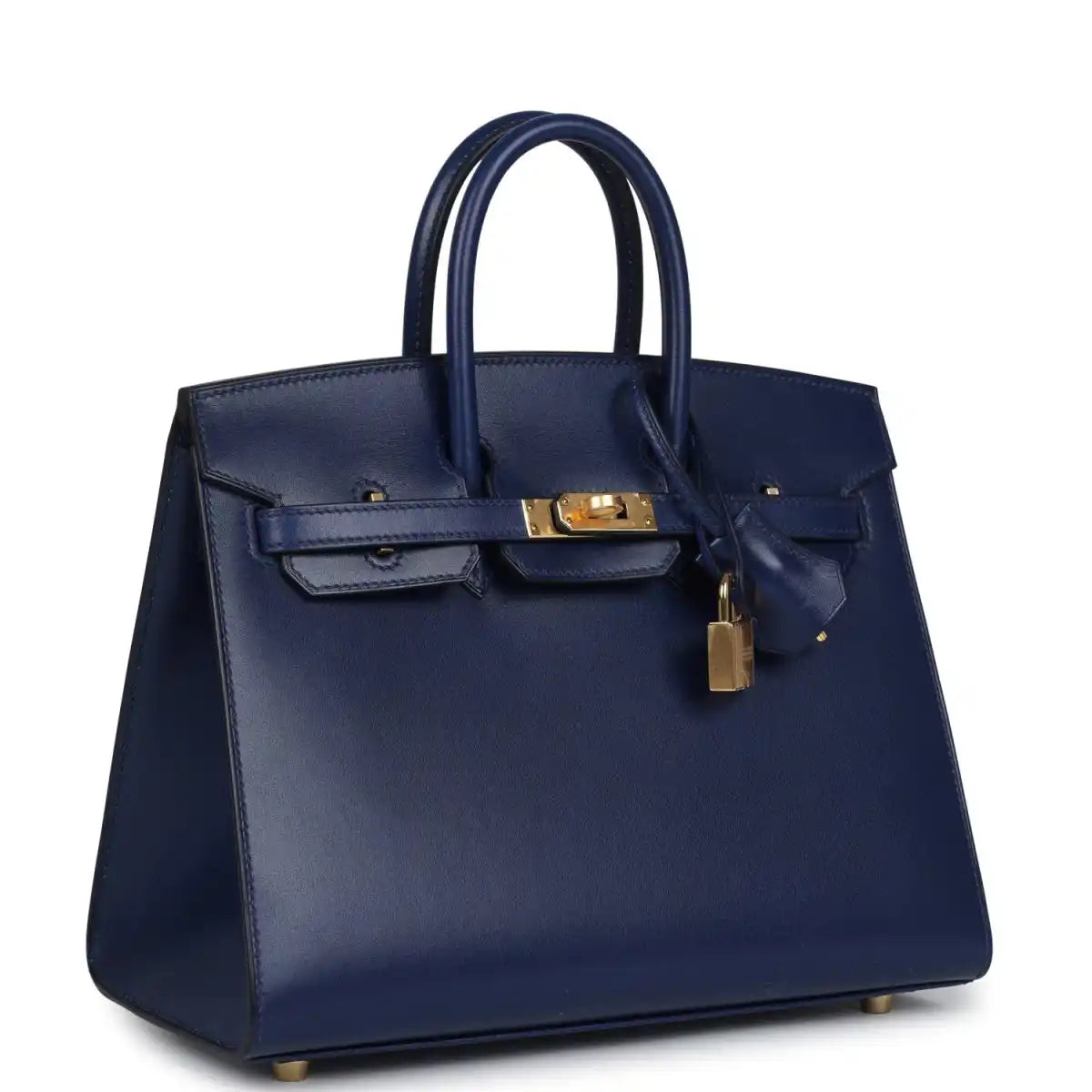 Structured blue handbag with top handles, front flap, gold hardware and hanging lock charm