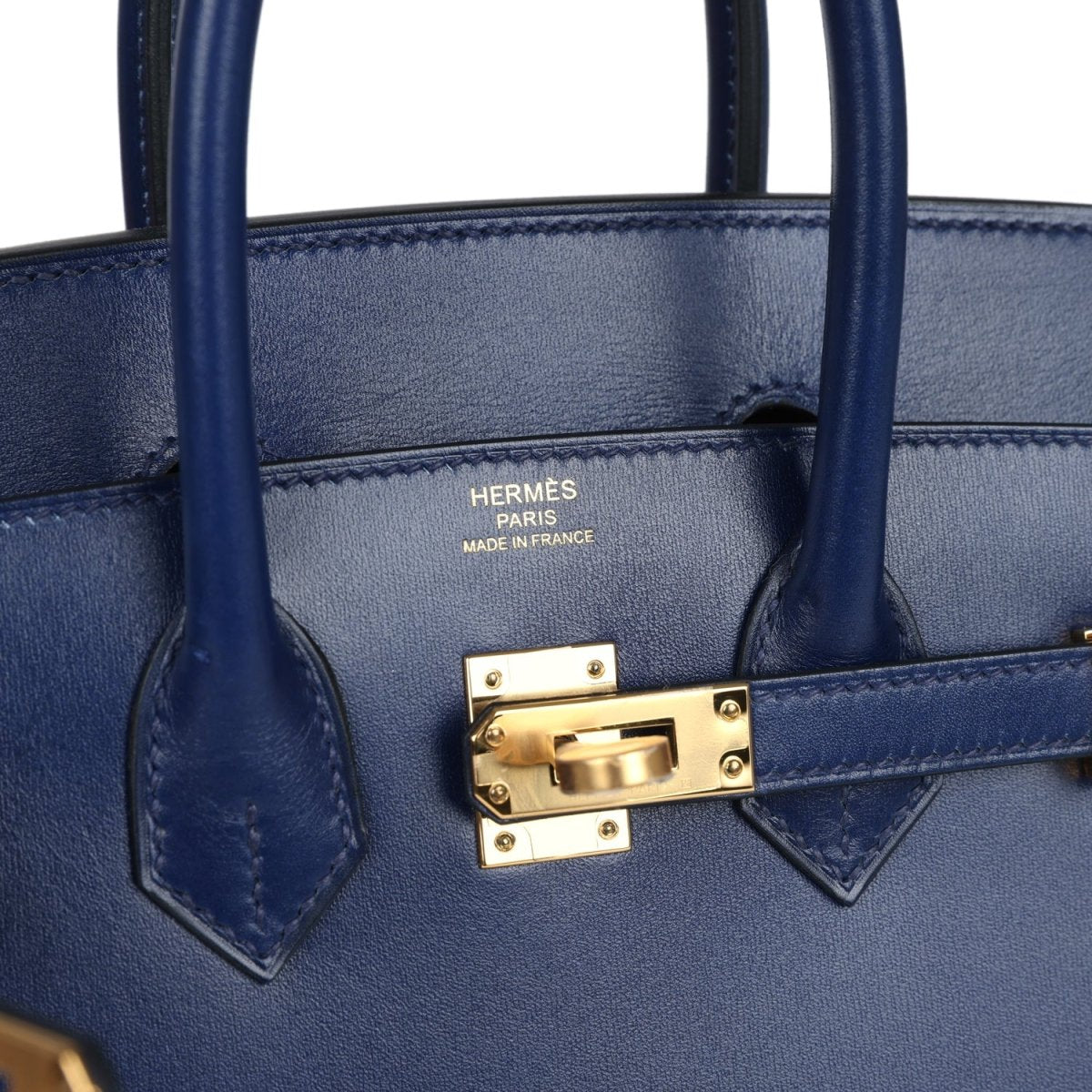 Blue leather Birkin 25 handbag interior panel with gold clasp and Hermes stamp