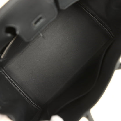 Black leather Hermes Birkin 25 handbag interior with smooth lining and stitched seams.