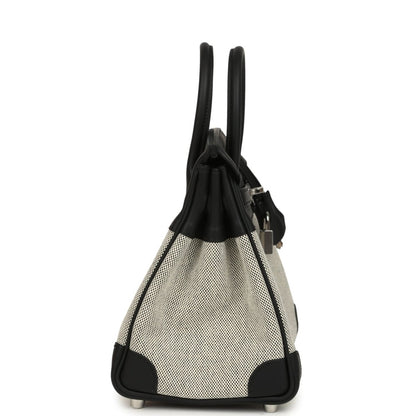 Black and cream canvas Hermes Birkin 25 handbag with side drawstring and feet.