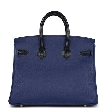 Hermes Birkin 25 handbag back view in blue with black alligator handle accents
