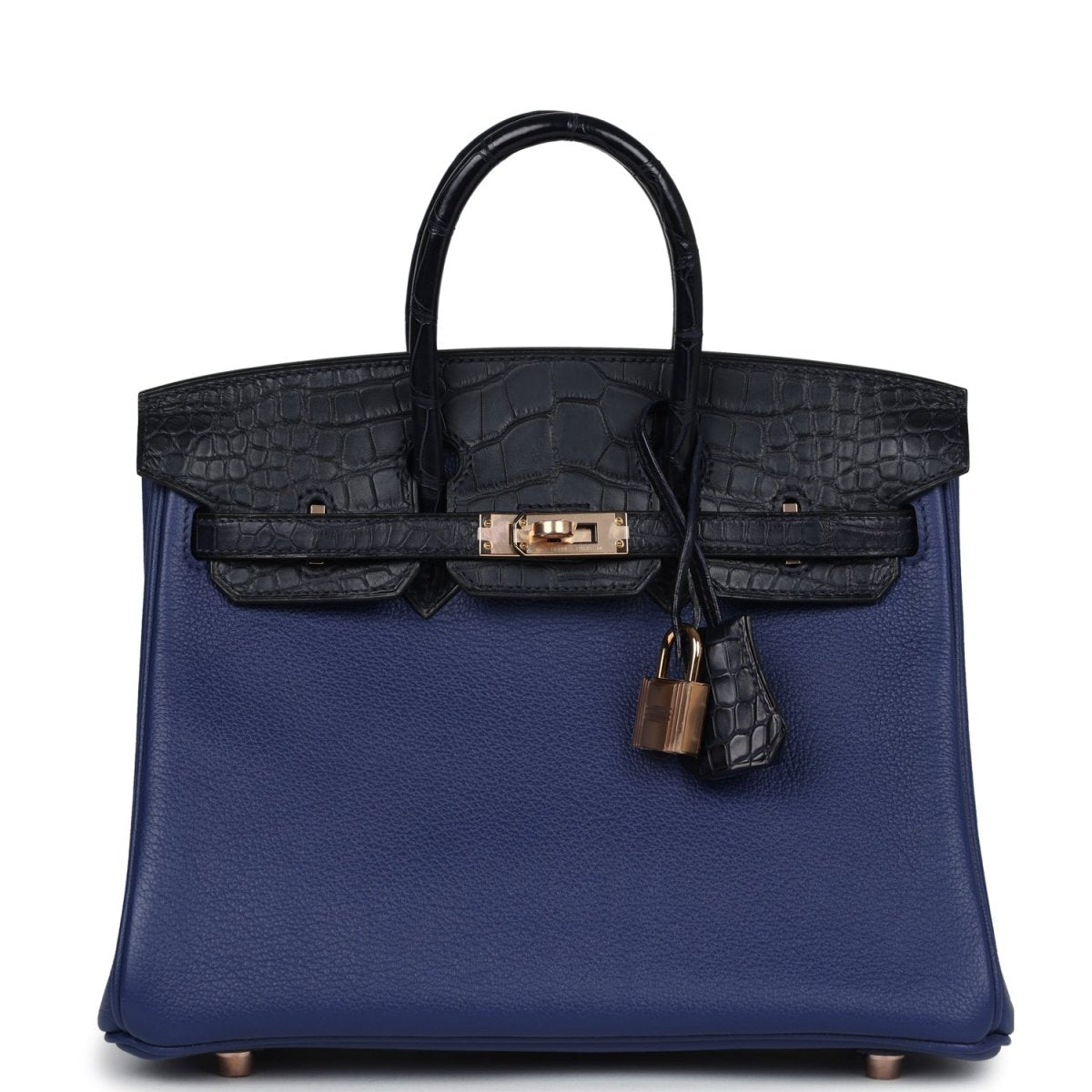 Hermes Birkin 25 handbag in blue with black alligator-style flap and gold clasp