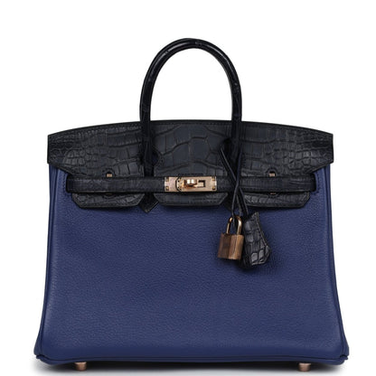 Hermes Birkin 25 handbag in blue with black alligator-style flap and gold clasp