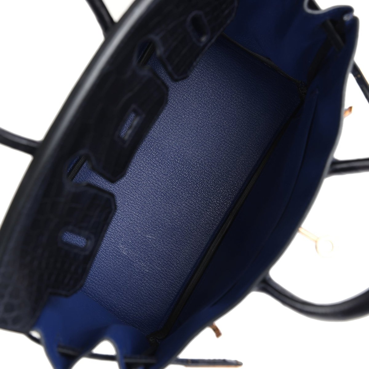 Hermes Birkin 25 handbag interior view with blue lining and black pocket panels