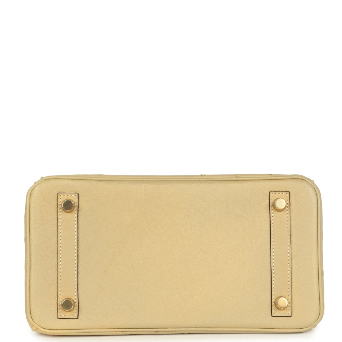Tan ostrich leather clutch-style pouch with exterior snap details and gold-tone hardware.
