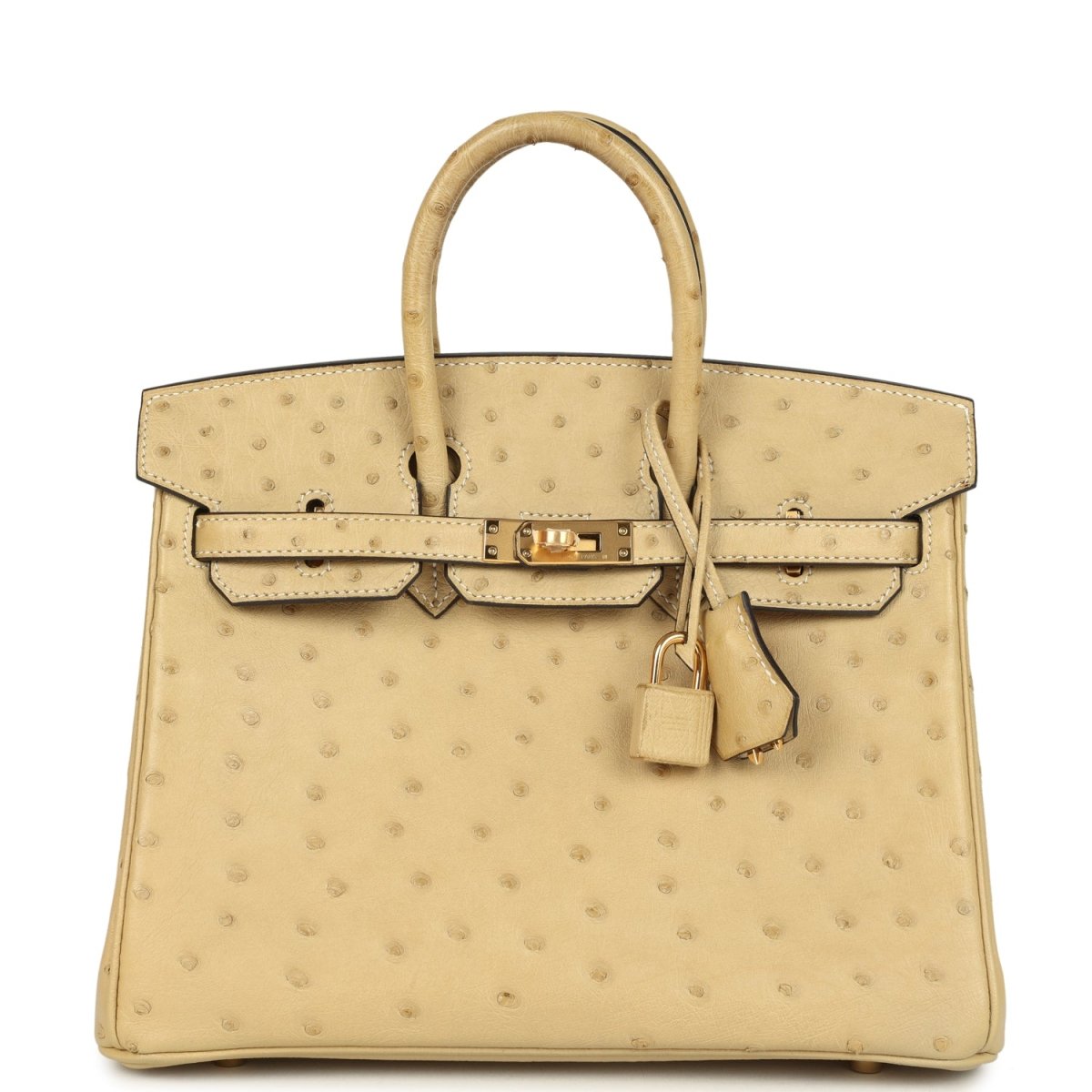 Tan ostrich leather handbag with top handle, front flap, and gold-tone clasp hardware.