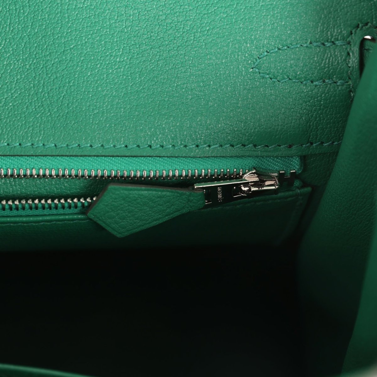 Green Togo leather Birkin 25 handbag interior with zipper track and small pouch