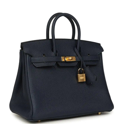 Blue Togo leather Birkin handbag with gold clasp, top handles, and front pockets