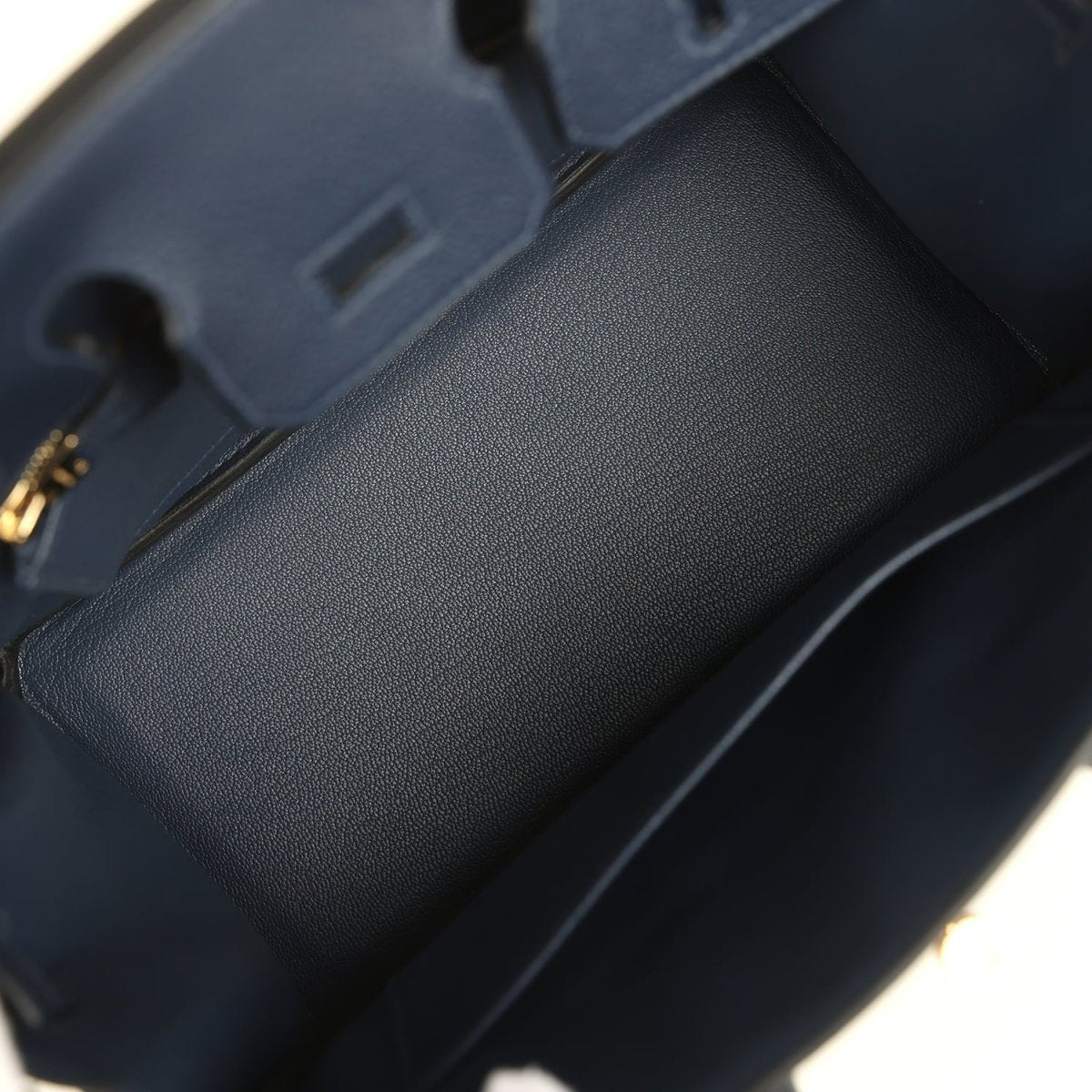 Blue Togo leather interior corner with smooth base and structured inner walls
