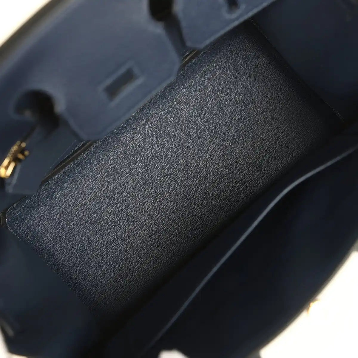 Blue Togo leather interior corner with smooth base and structured inner walls