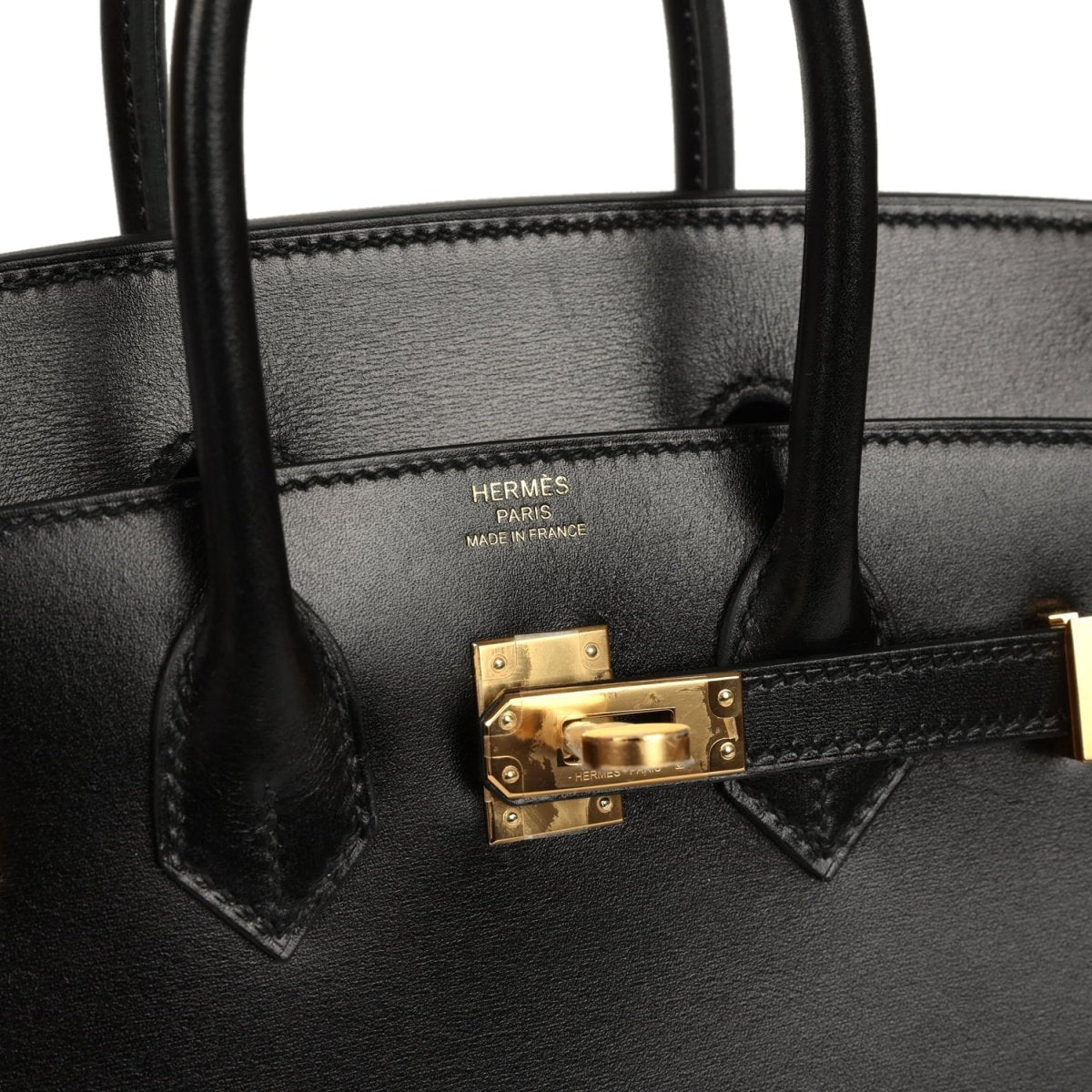 Hermes Birkin handbag interior with gold-tone lock plate and leather lining