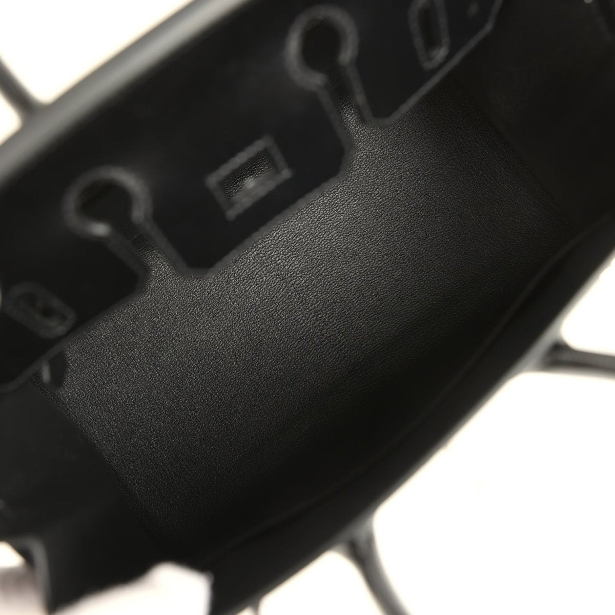 Hermès Birkin Sellier 25 handbag interior close-up, black lining and stitched compartments