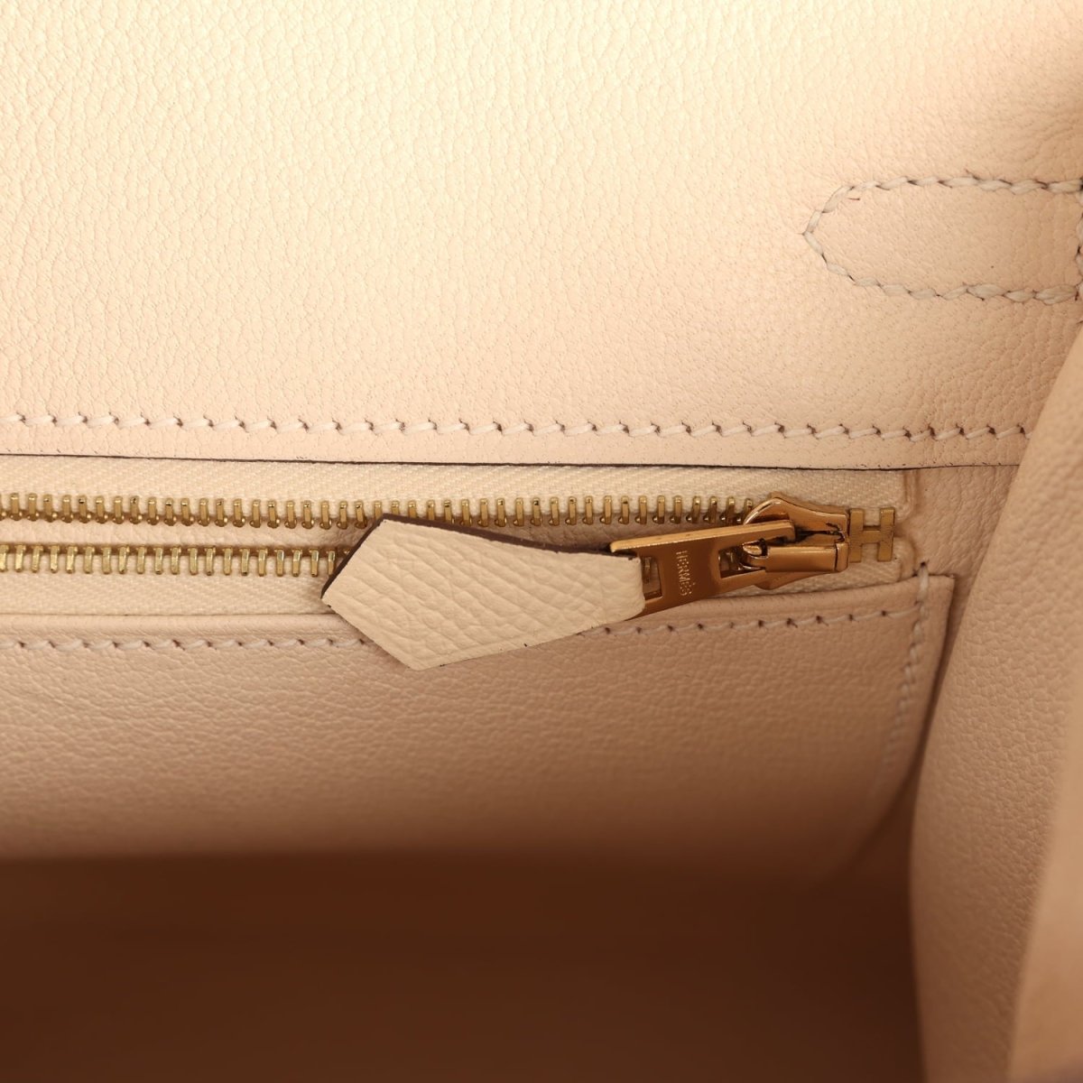 Hermes Birkin Sellier 25 handbag interior close-up with zipper track and leather puller