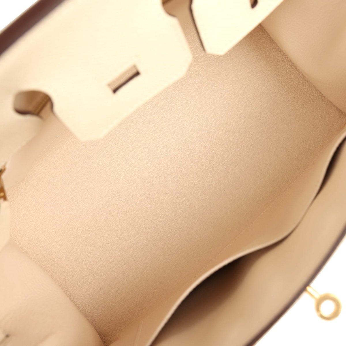 Hermes Birkin Sellier 25 handbag interior view with cream leather lining and hanging tag