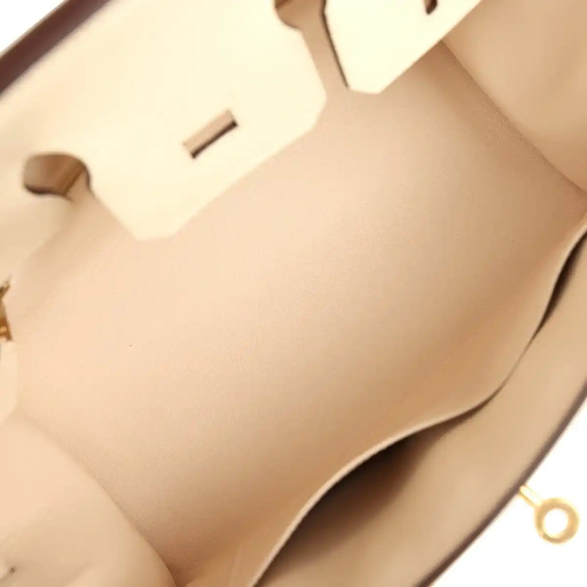 Hermes Birkin Sellier 25 handbag interior view with cream leather lining and hanging tag