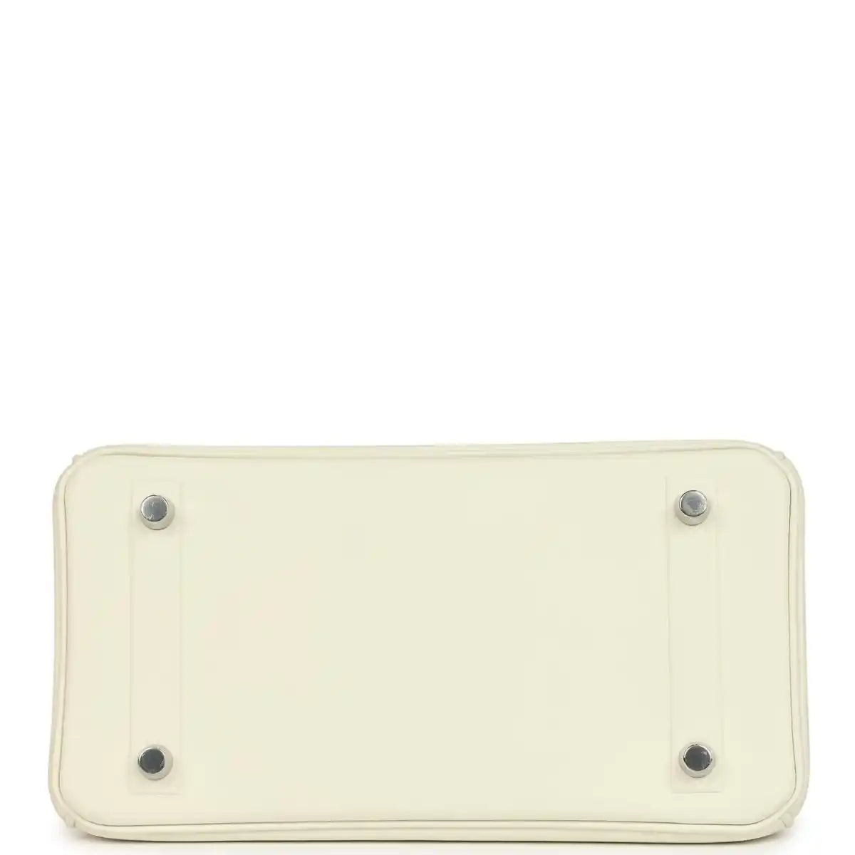 Cream leather handbag base with four metal feet and stitched rectangular bottom.