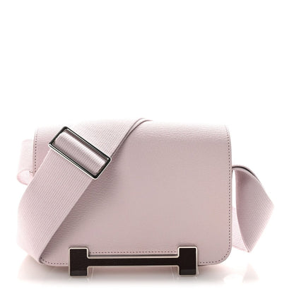 Hermès Geta messenger bag flap and crossbody strap with silver-tone clasps on pale leather