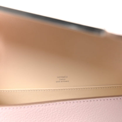 Hermès Geta messenger bag interior with embossed branding on light beige leather