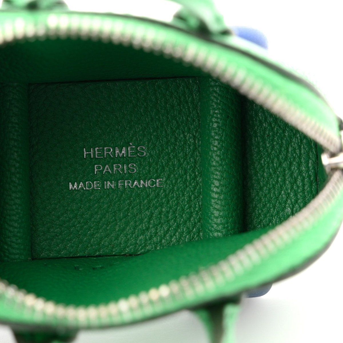 Green leather lining with stamped 'HERMES PARIS MADE IN FRANCE' text
