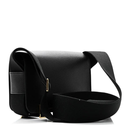 HERMES black leather crossbody bag with wide strap and gold-tone clasp detail
