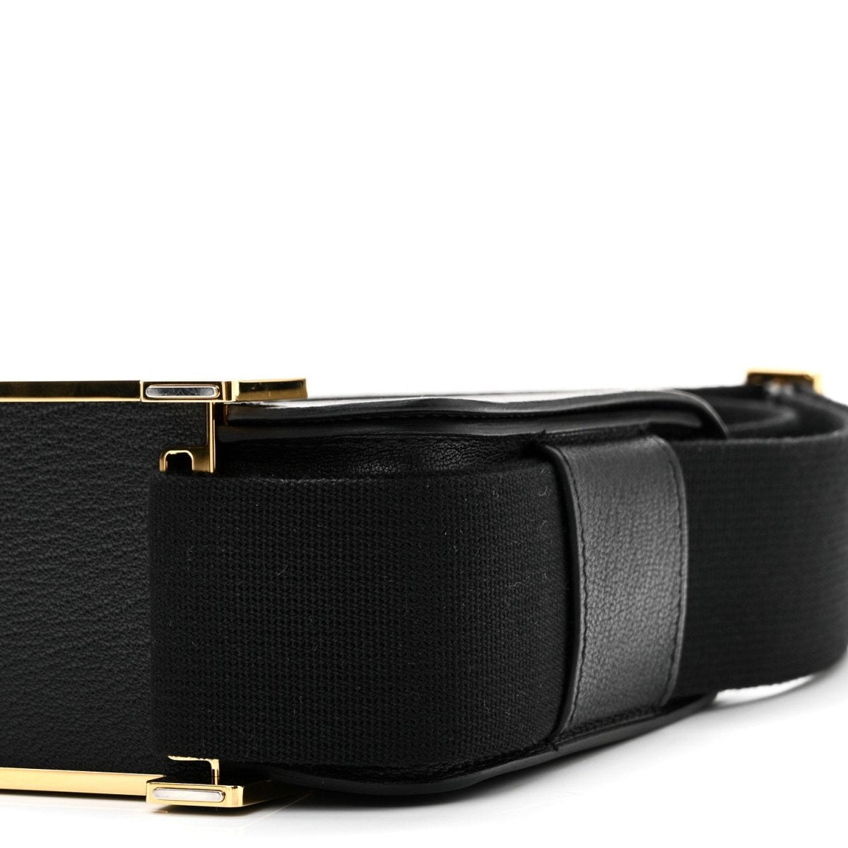 HERMES black leather crossbody bag side view with gold-tone clasp and strap