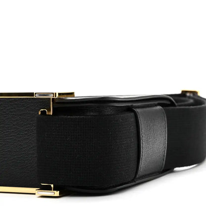 HERMES black leather crossbody bag side view with gold-tone clasp and strap