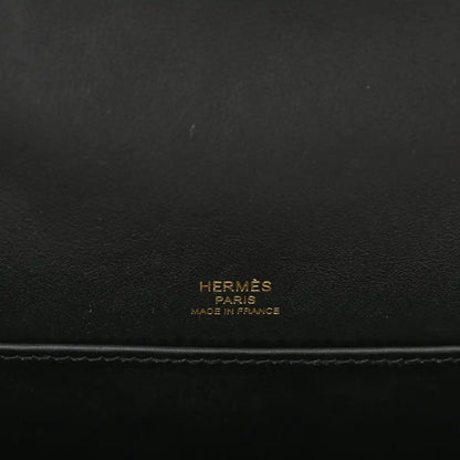 HERMES black leather crossbody bag with embossed “HERMÈS PARIS MADE IN FRANCE”