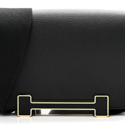 HERMES black leather crossbody bag flap with gold-tone clasp hardware