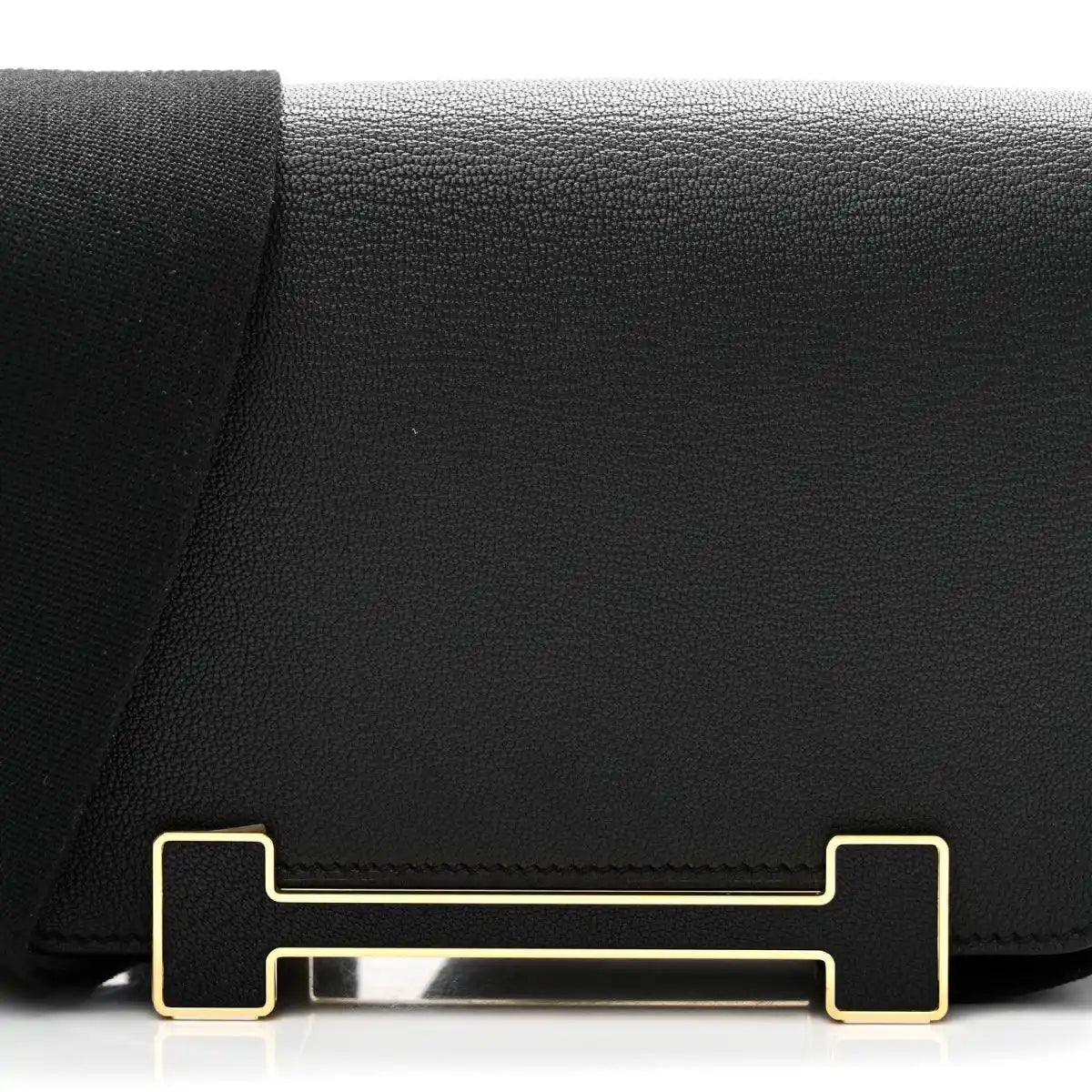HERMES black leather crossbody bag flap with gold-tone clasp hardware