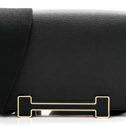 HERMES black leather crossbody bag flap with gold-tone clasp hardware