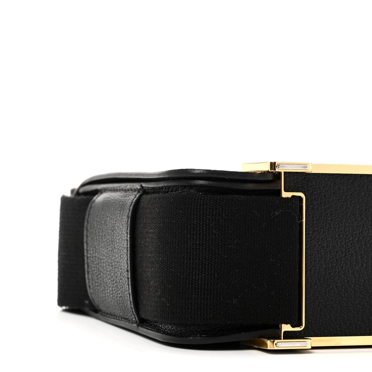 Hermes black leather crossbody bag side view with gold-tone clasp hardware