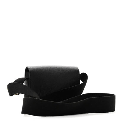 Hermes black leather crossbody bag with wide strap and structured flap